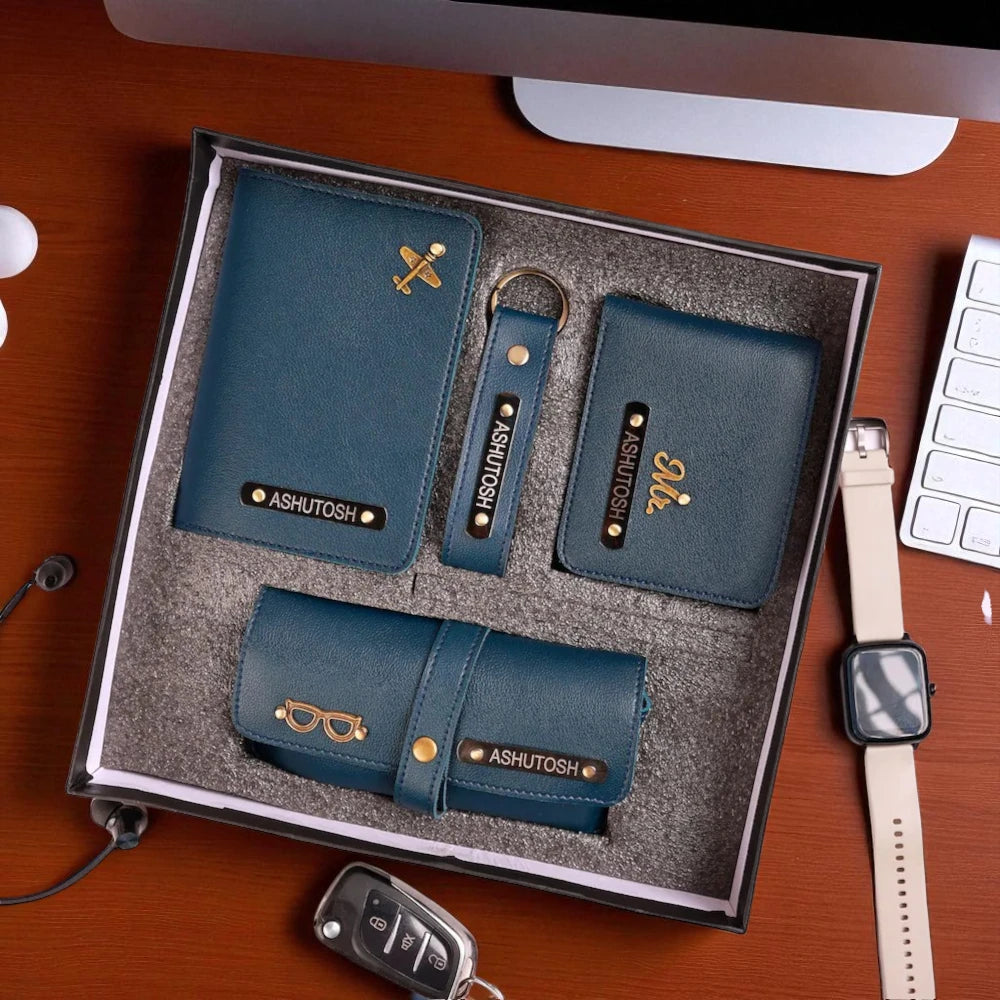 Personalized blue leather gift set for him with wallet, keychain, and accessories.