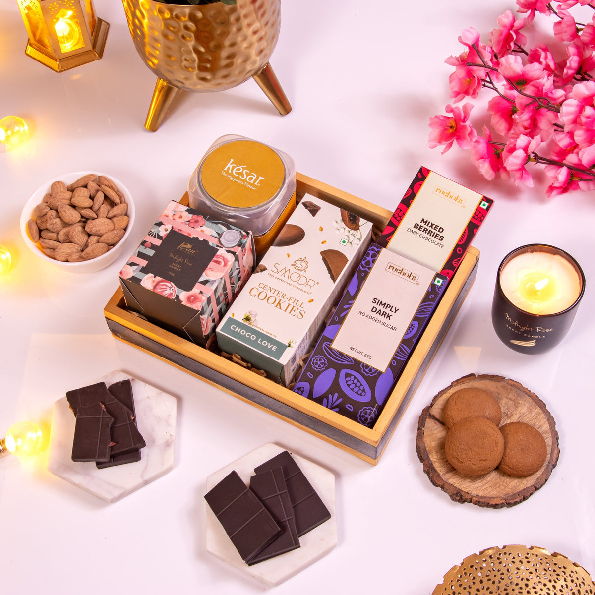 Romantic gift box with cookies, chocolates, and candles for long distance love