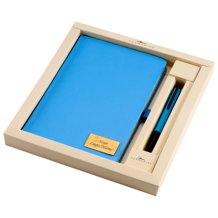Blue notebook and pen set in a beige box on a white background