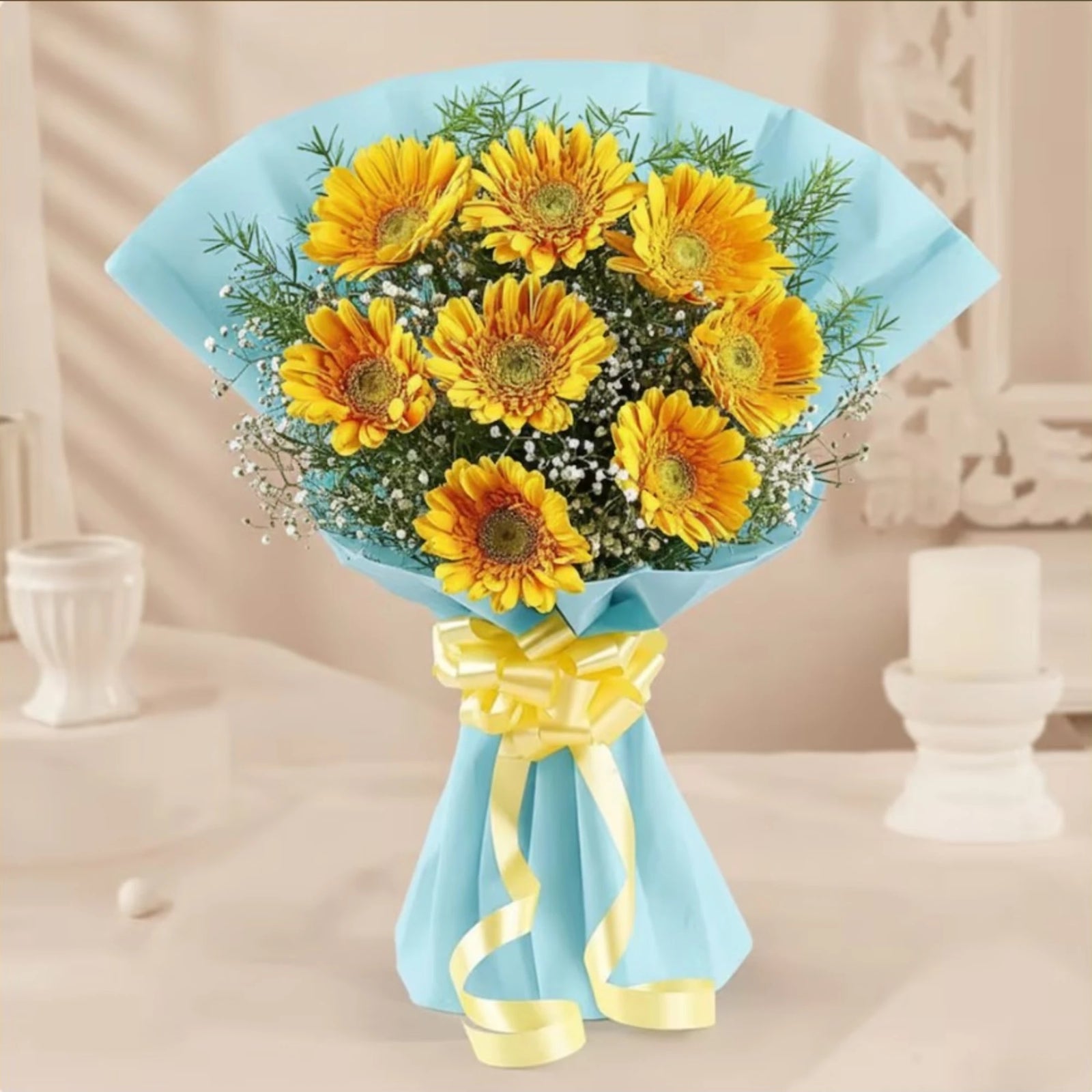 Yellow gerbera bouquet with blue wrapping