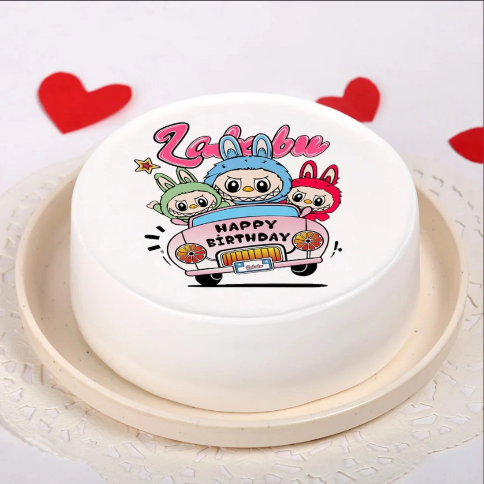 Birthday cake with cartoon characters and hearts