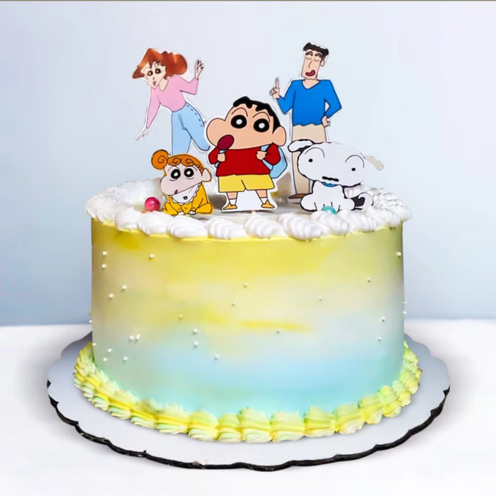 Colorful cartoon characters cake with white frosting and yellow border for birthday celebration
